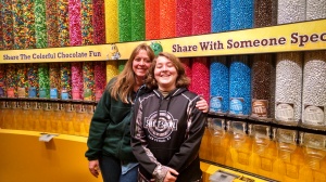 Colleen Kimble (L) and Logan Kimble-Lee (R) sharing a smile at the M&M store on Las Vegas Boulevard